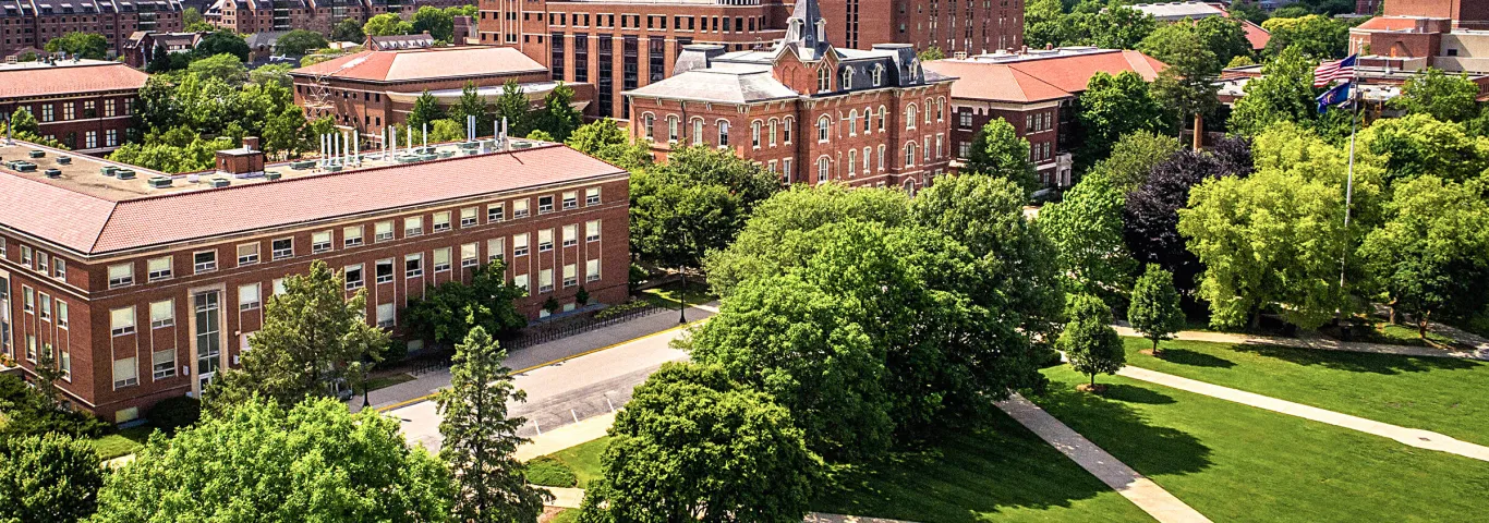 a college campus with buildings and trees