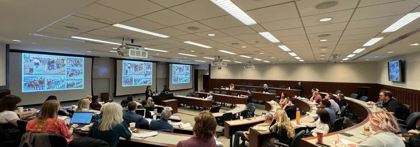 people sitting in a lecture hall